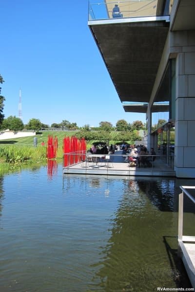 Glass reeds and fish at the reflecting pool at the VMFA