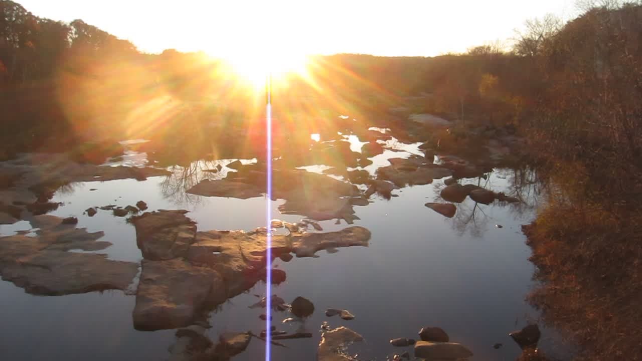 Sunset view from footbridge to Belle Isle (southside; Reedy Creek)